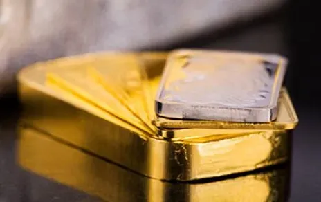 Spot silver surges, gold firms as CPI risk lifts yields