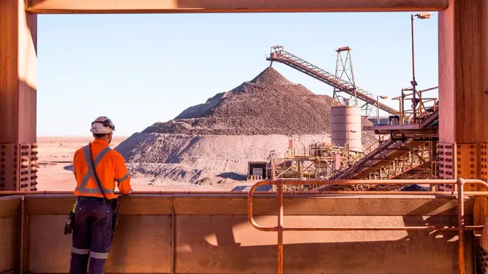Australia shares climb to near one-month high as miners rally