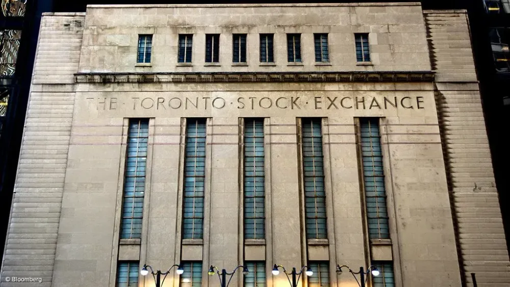 TSX hits record high as mining and technology shares jump